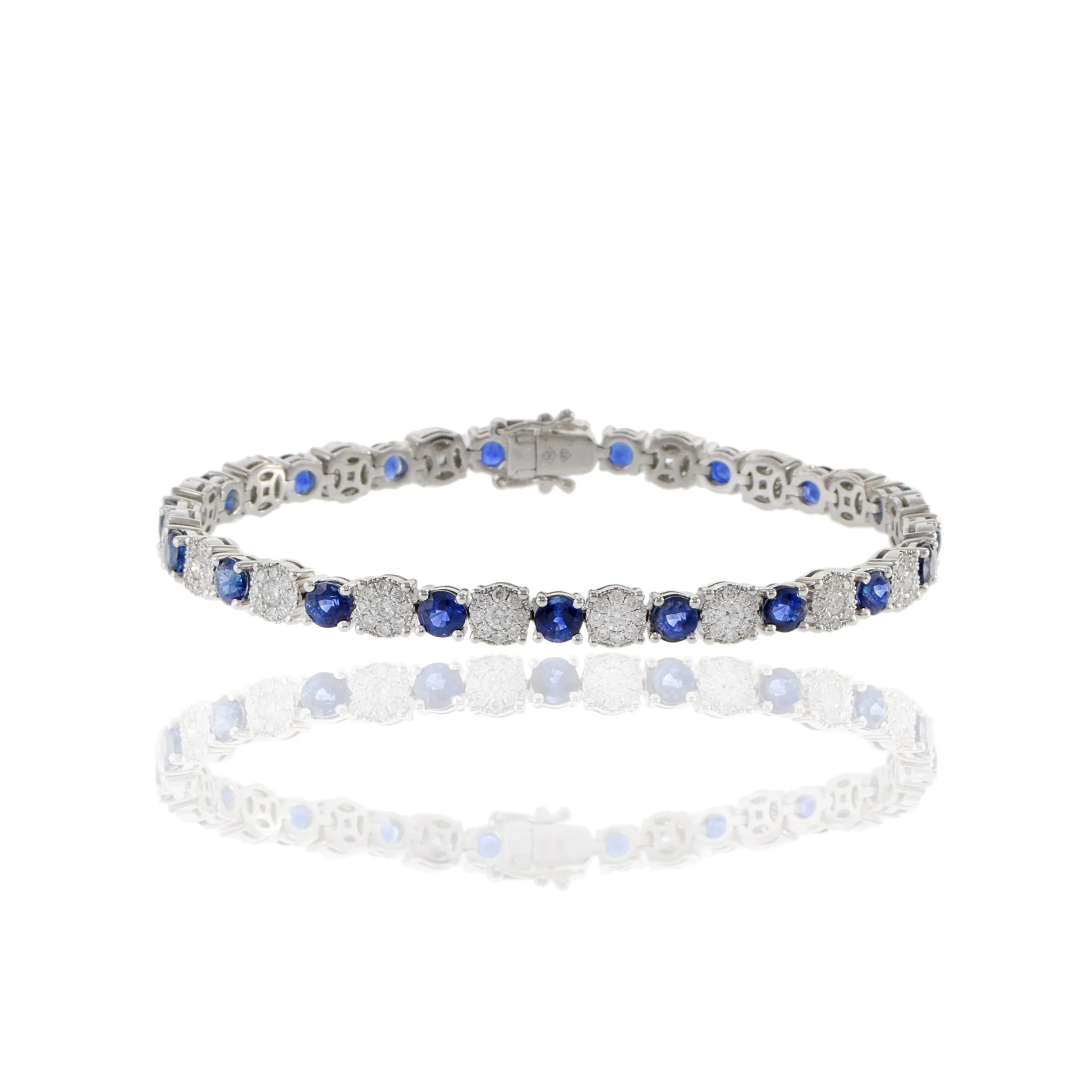 18KT White Gold Round Cut Sapphire And Cluster Diamond Bracelet
