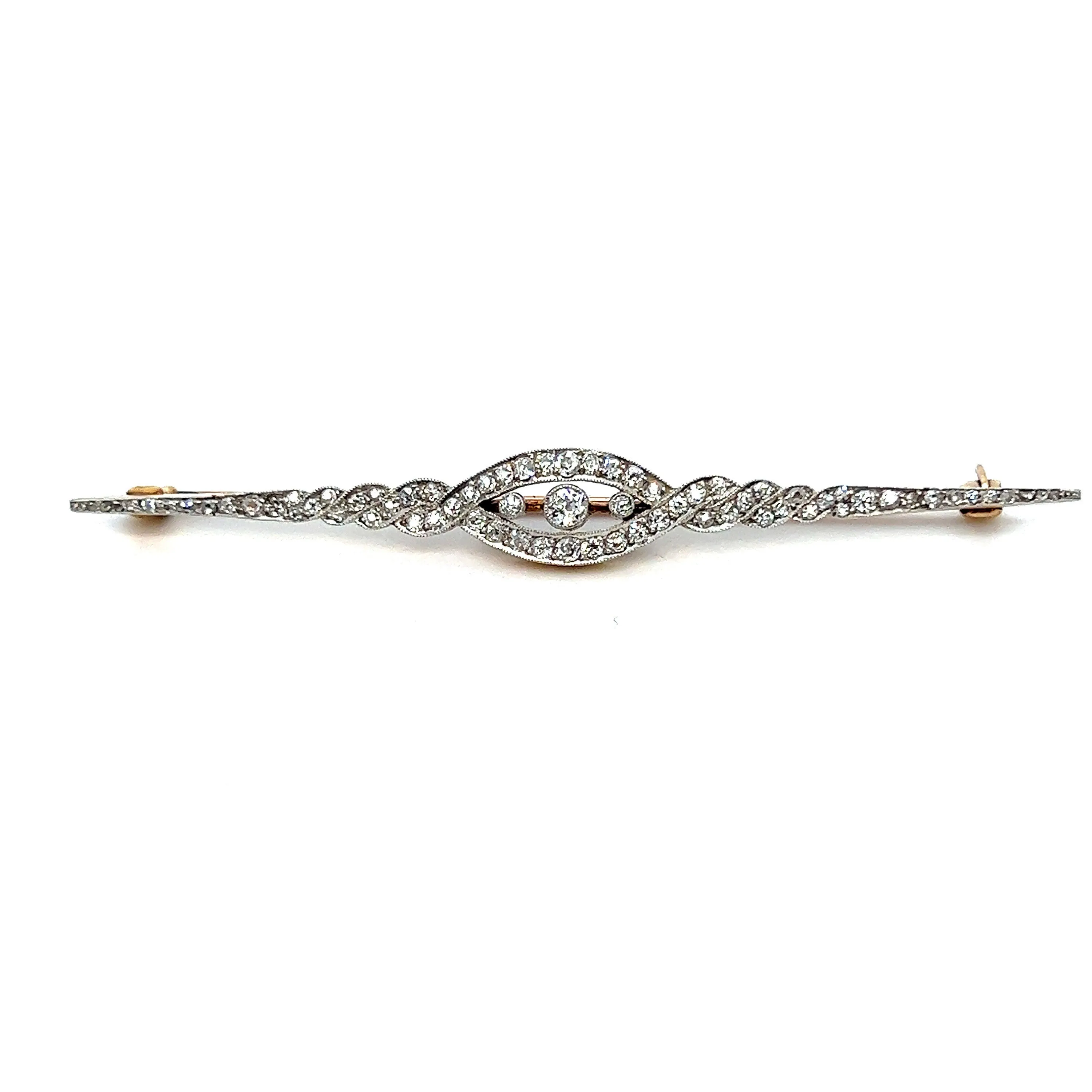 Antique Platinum/ 18K Yellow Gold Diamond Bar Brooch.
