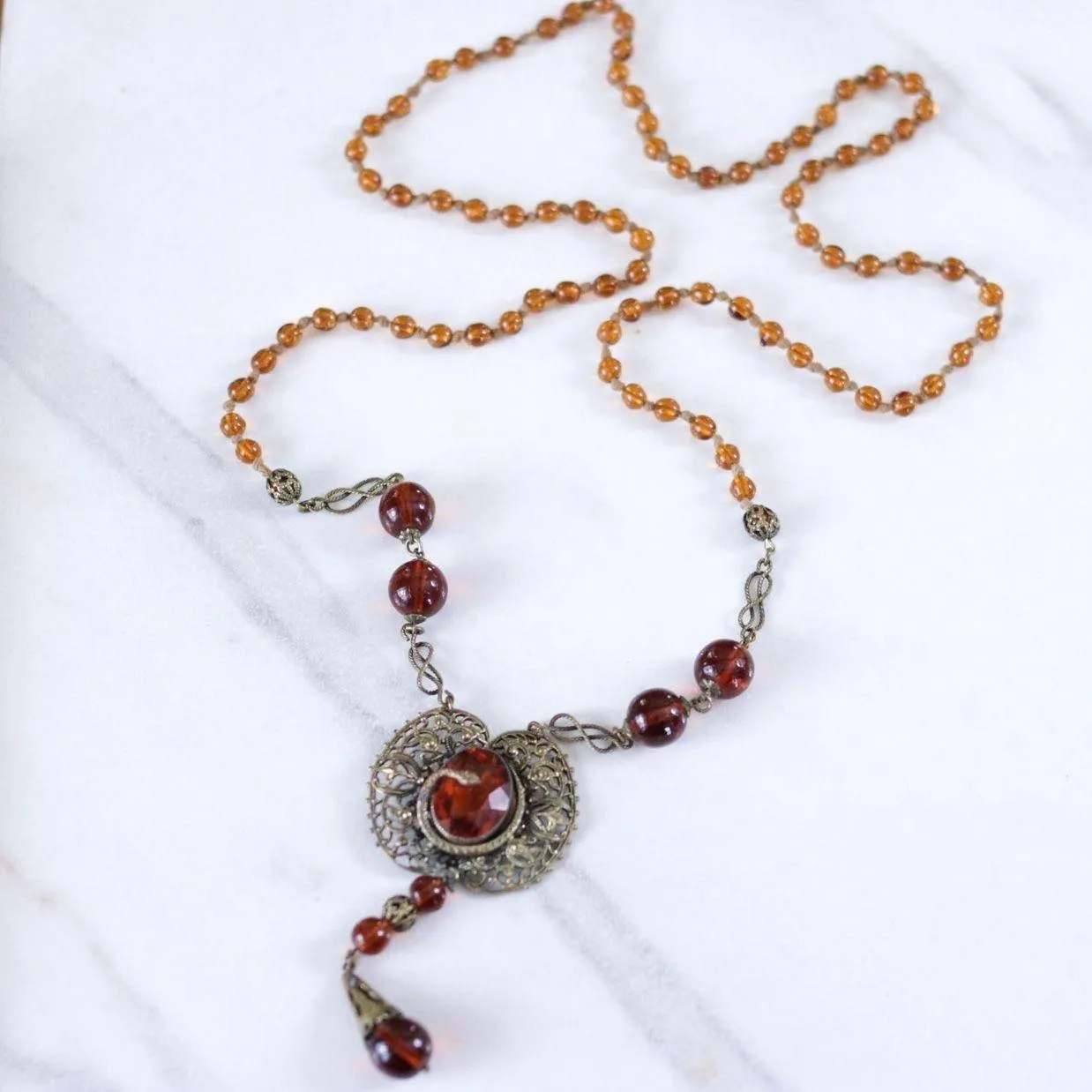 Vintage Long Art Deco Amber Glass Necklace with Brass Accent with Serpent